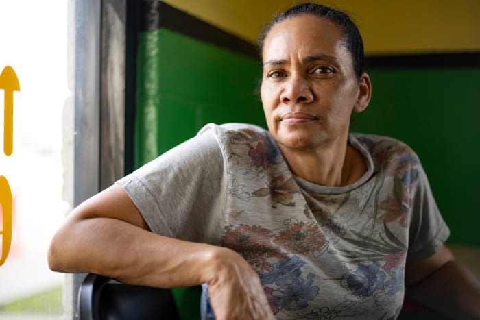 Sandra Estrada now finds that her restaurant is empty on Sundays, despite the crush of football fans who come into town.
